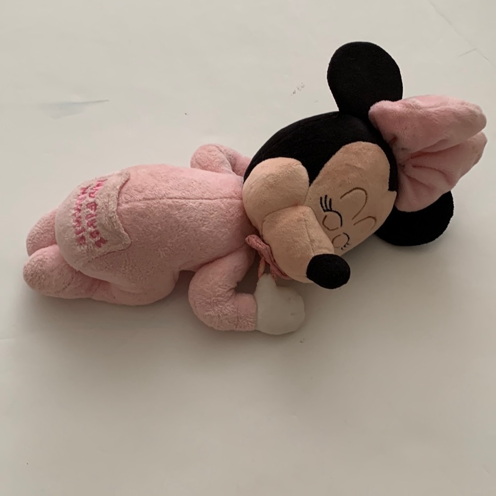Minnie mouse, plush with pacifier, plays music